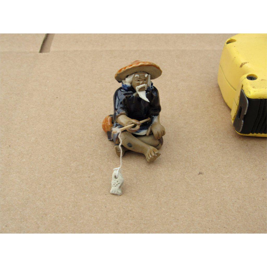 Fisherman Ceramic Figurine