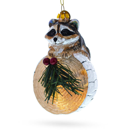 Curious Raccoon on the Log Blown Glass Christmas Ornament