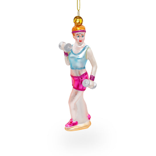 Fit Girl Exercising with Dumbbells Glass Christmas Ornament