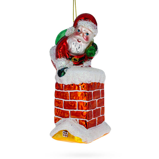 Santa Climbing Chimney Blown Glass Christmas Ornament