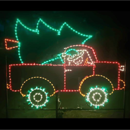 Elf In Truck With Christmas Tree