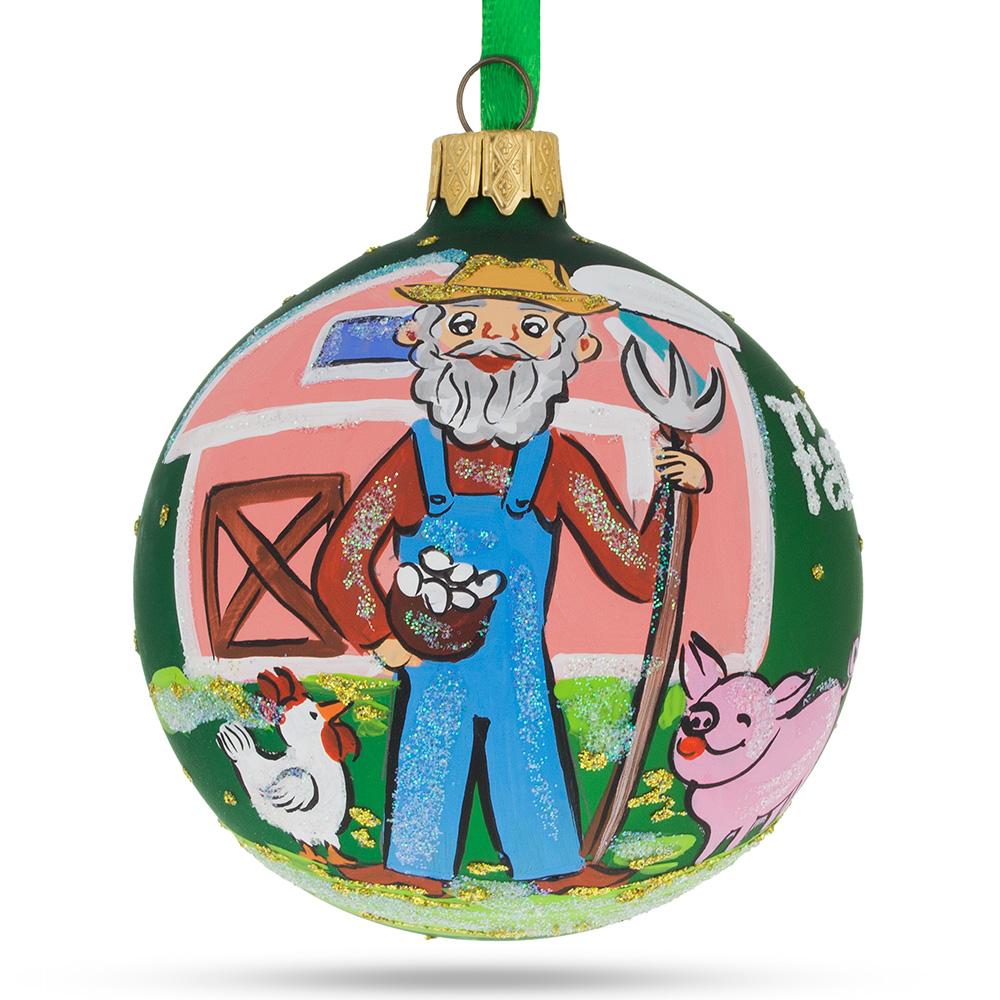 Farmer by the Barn Blown Glass Ball Christmas Ornament 3.25 Inches